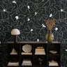 black-and-white wallpaper featuring abstract floral linework that feels both modern and organic.