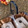 Amberstone Granite countertop film 83 installed around a kitchen sink with realistic granite texture