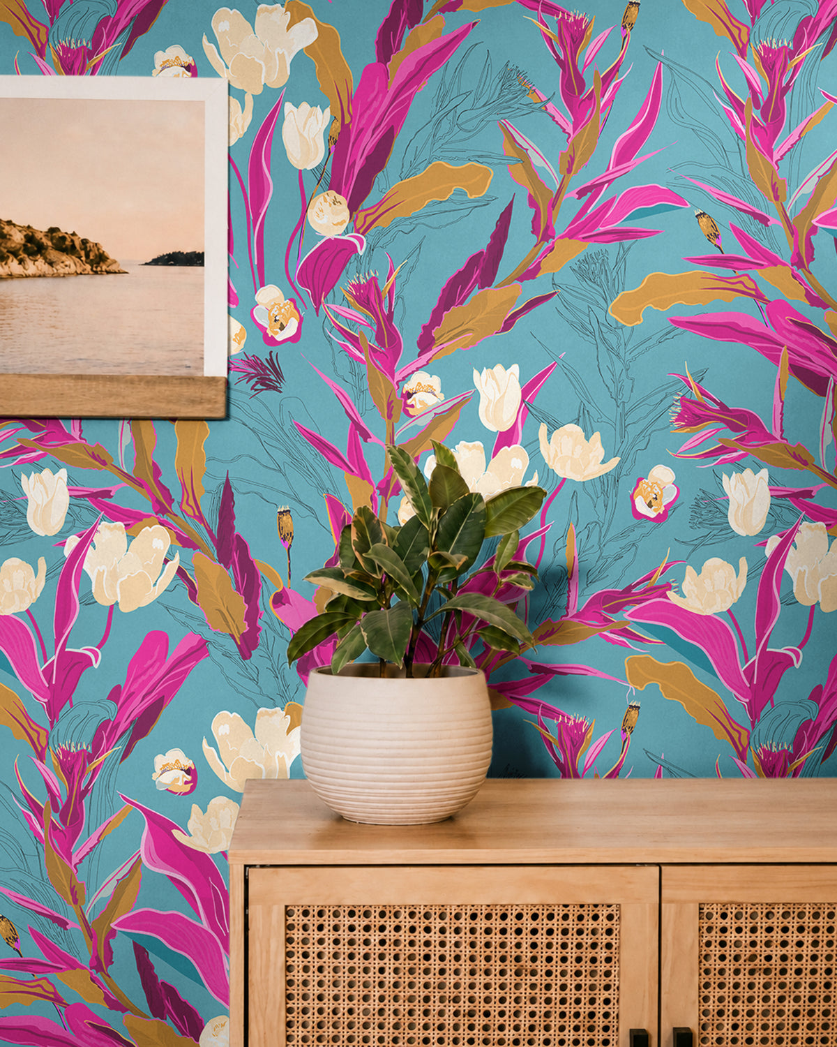 Blue Tropical Floral 2236 bold botanical wallpaper with vibrant pink foliage, cream flowers and golden accents on a bright blue background