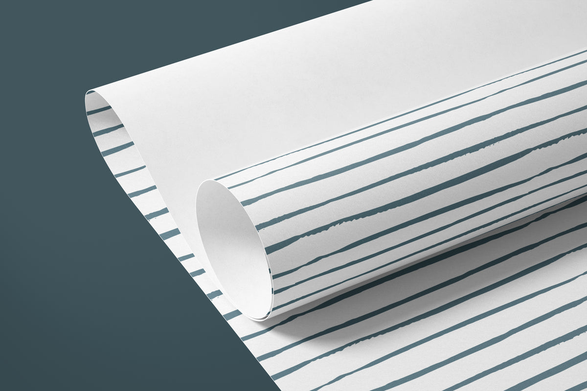Detail view of blue and white striped contact paper with hand-drawn lines and a clean, understated farmhouse style.