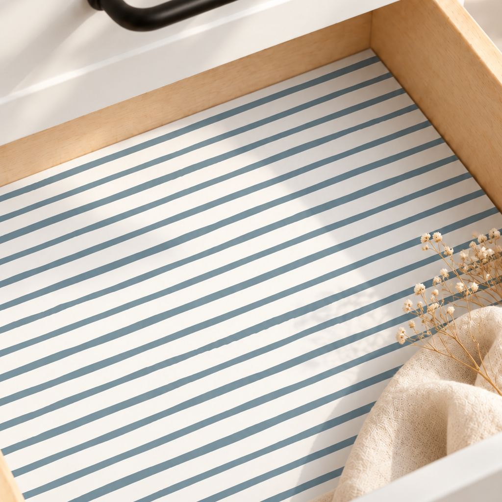 Hand-drawn slate blue stripes on a crisp white background Installed in white drawers