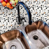 Ivory Atelier Terrazzo countertop film 106 installed on a kitchen counter with soft terrazzo texture