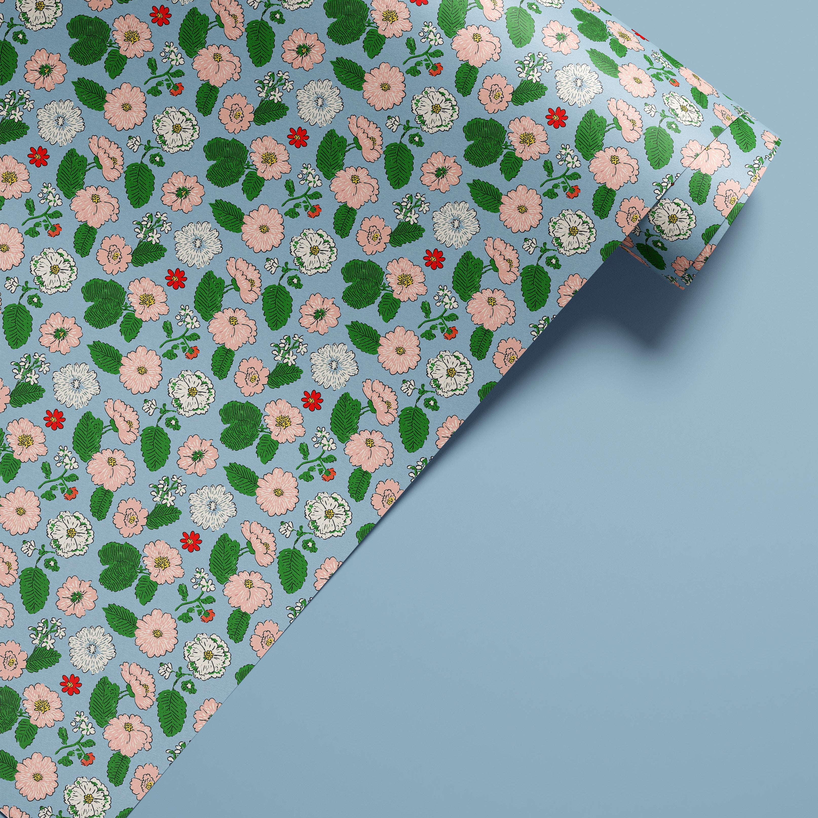 blue botanical contact paper with pink white and red flowers
