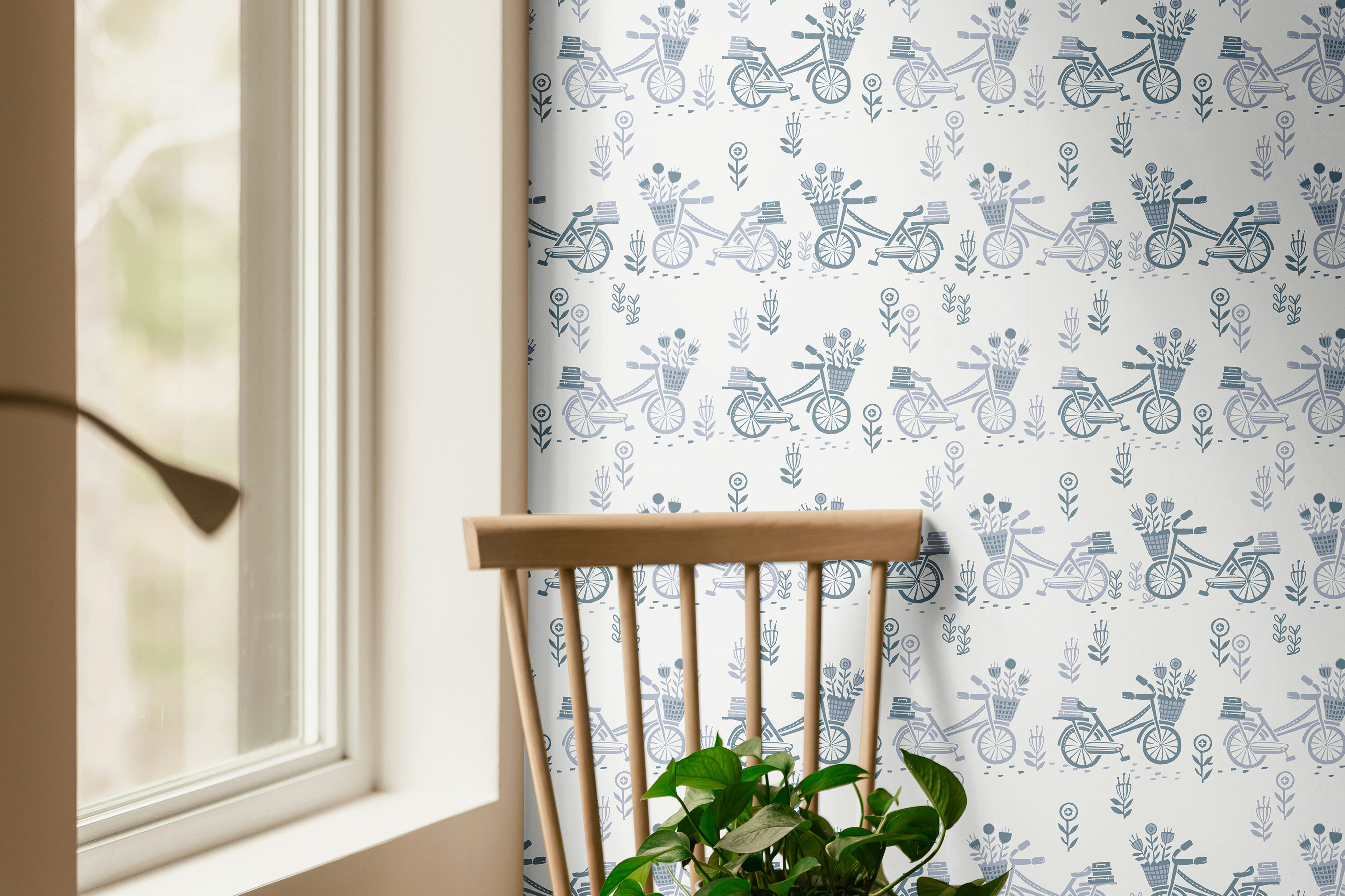 Muted Blue Bicycles 3749 wallpaper with vintage blue bicycles, flower baskets and small botanical details on a soft white background