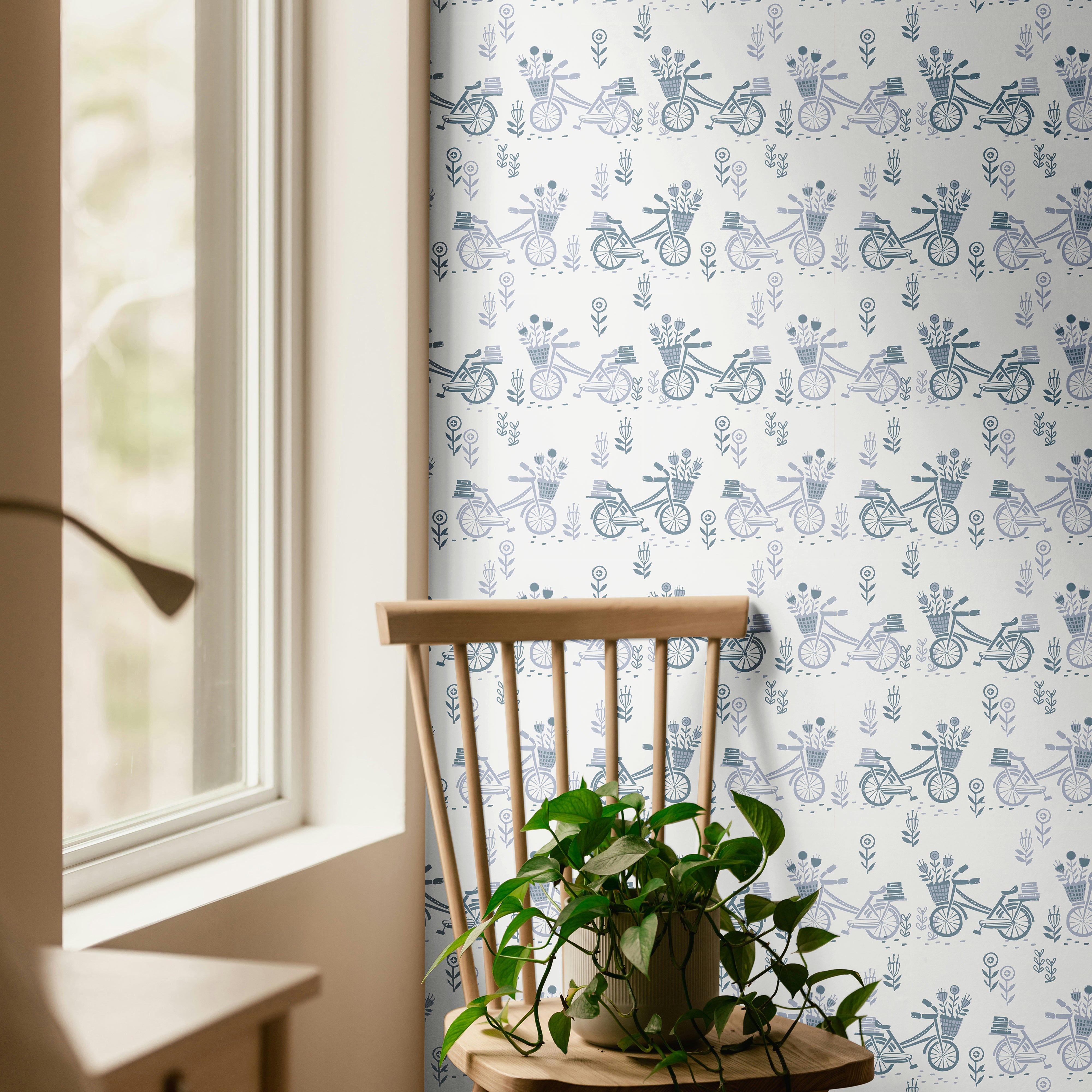 Muted Blue Bicycles 3749 wallpaper with vintage blue bicycles, flower baskets and small botanical details on a soft white background