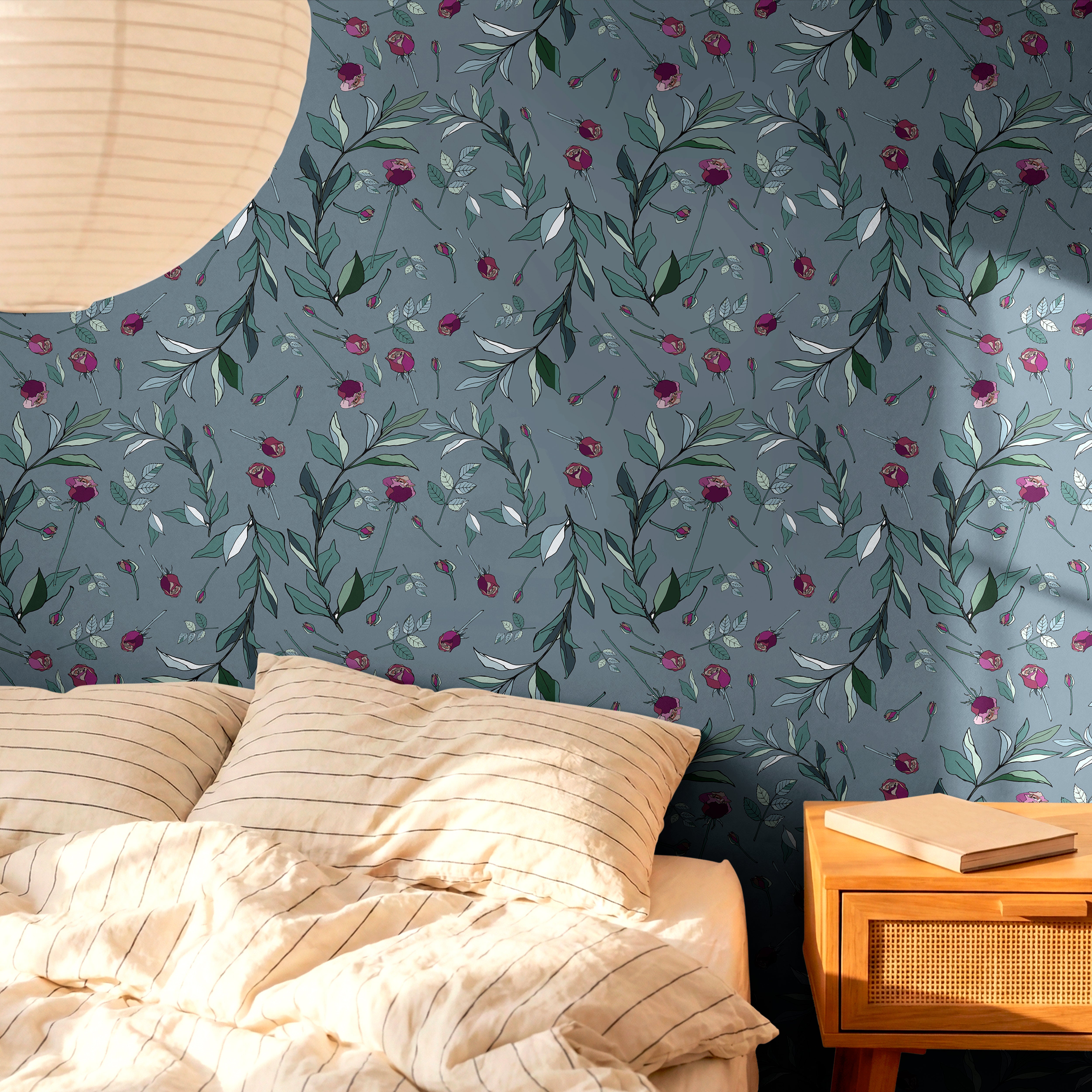 Moody botanical wallpaper featuring hand-drawn floral stems and soft organic detailing on a blue gray background.

