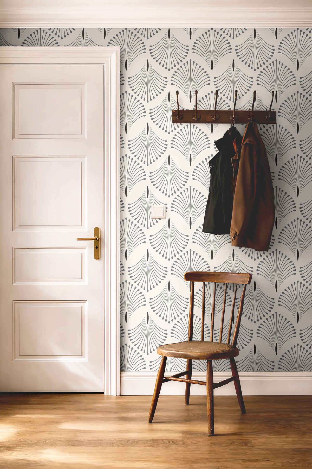 Taupe geometric wallpaper with minimalist Art Deco styling and repeating botanical fan motifs.