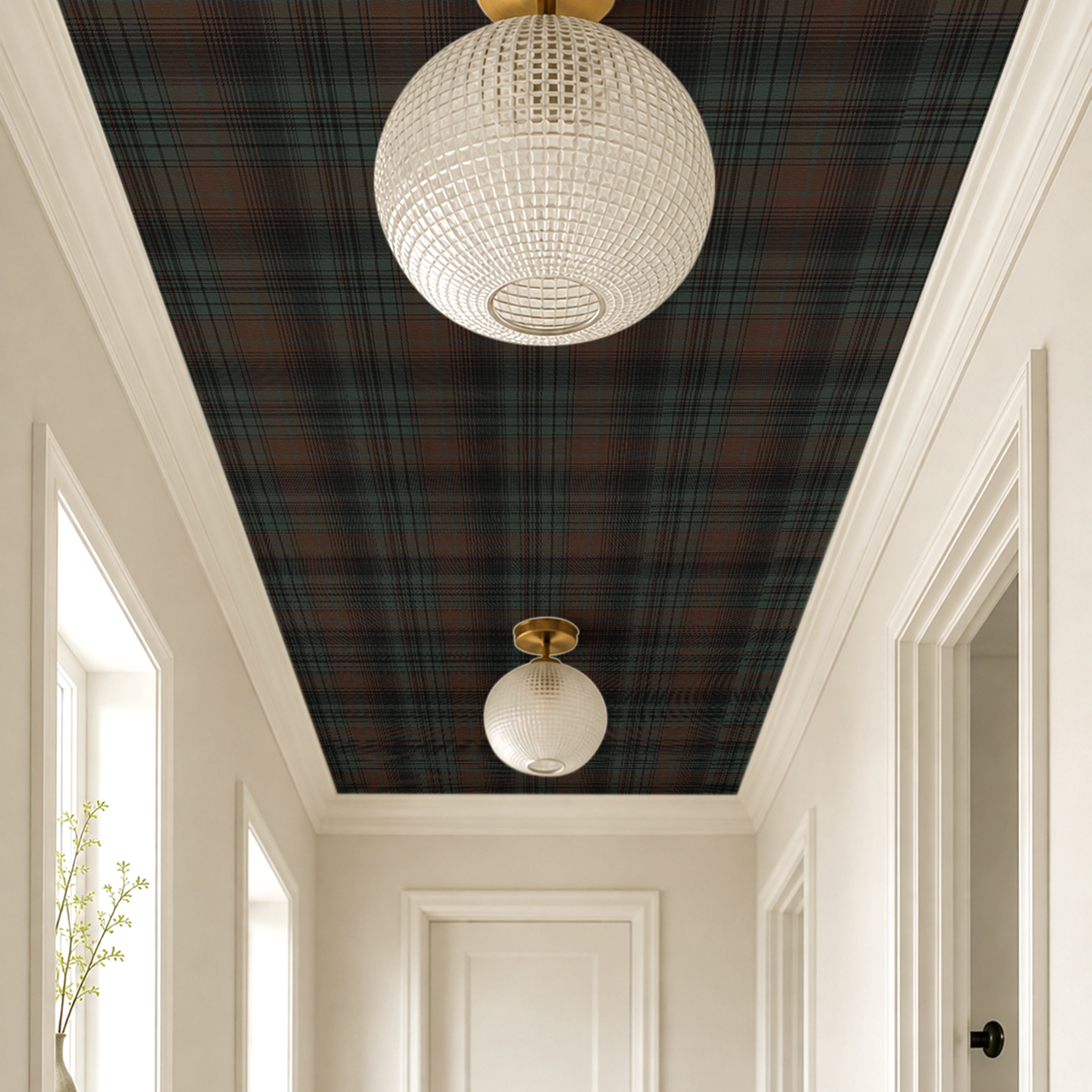  dark forest green tartan wallpaper on ceiling with cream walls and warm golden lighting fixture accents
