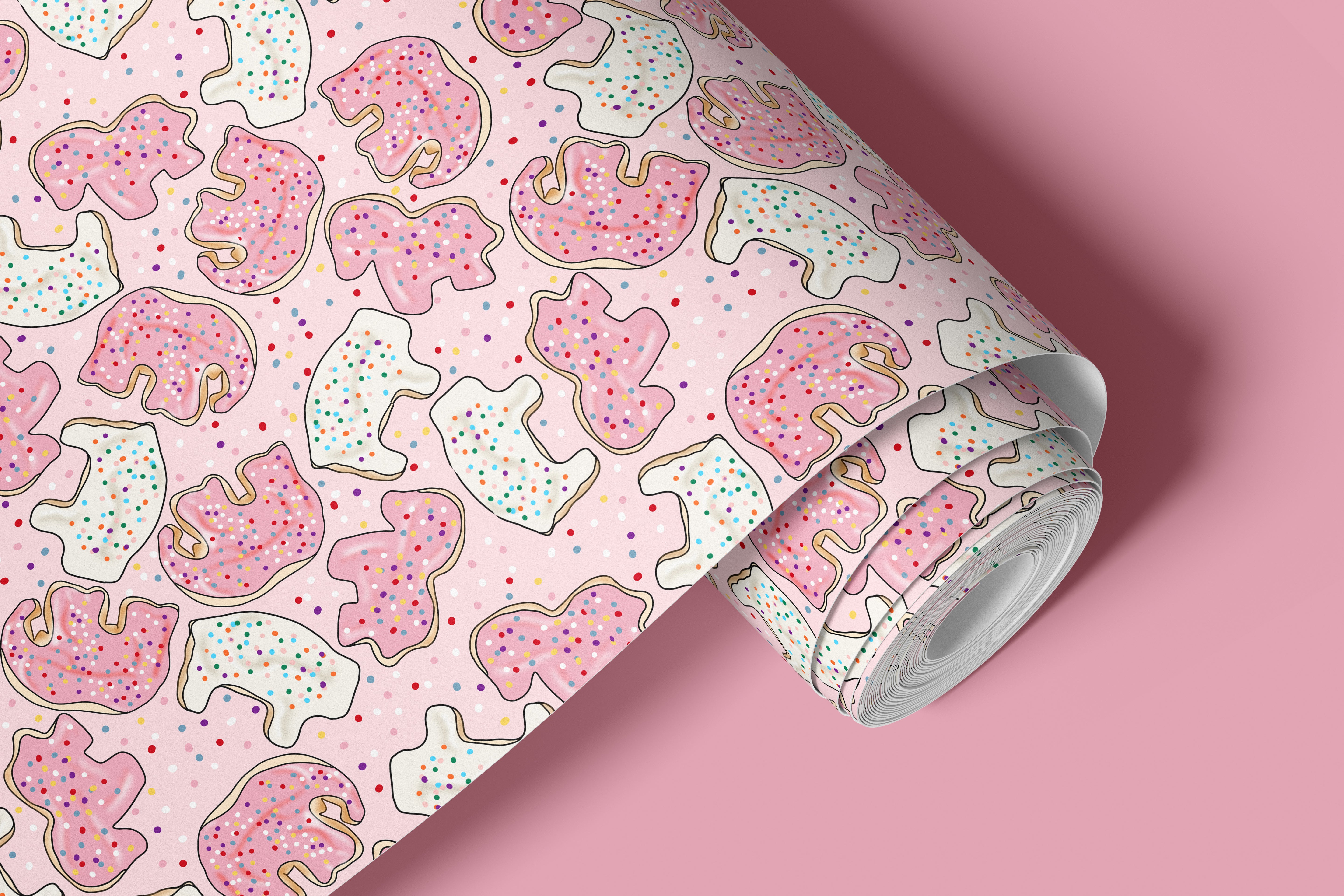 roll of sprinkle safari pink contact paper with frosted animal cookies and colorful sprinkles on bright pink background

