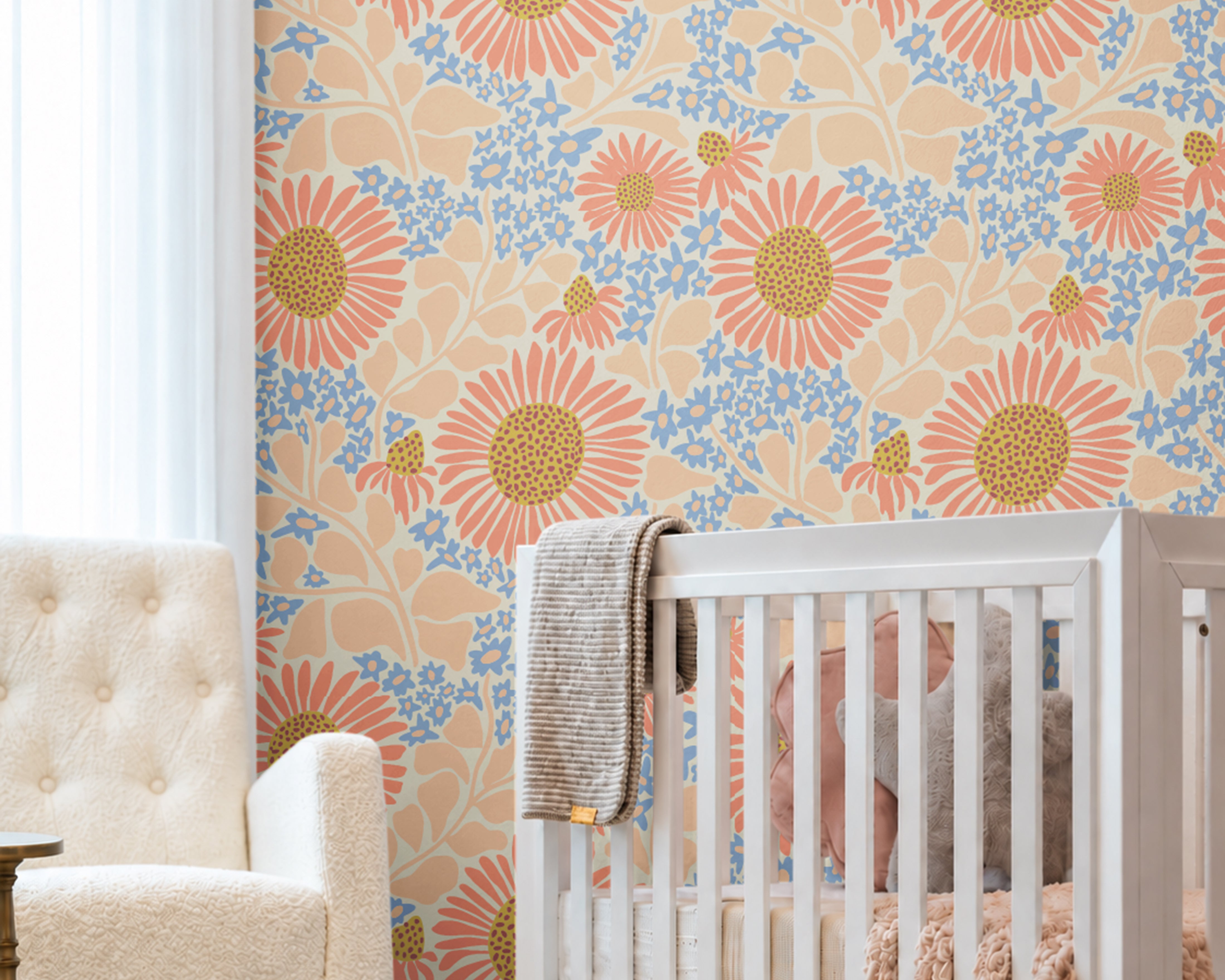 Warm Bloom colorful floral wallpaper with coral flowers, soft blue blossoms and peach foliage in a bright neutral nursery