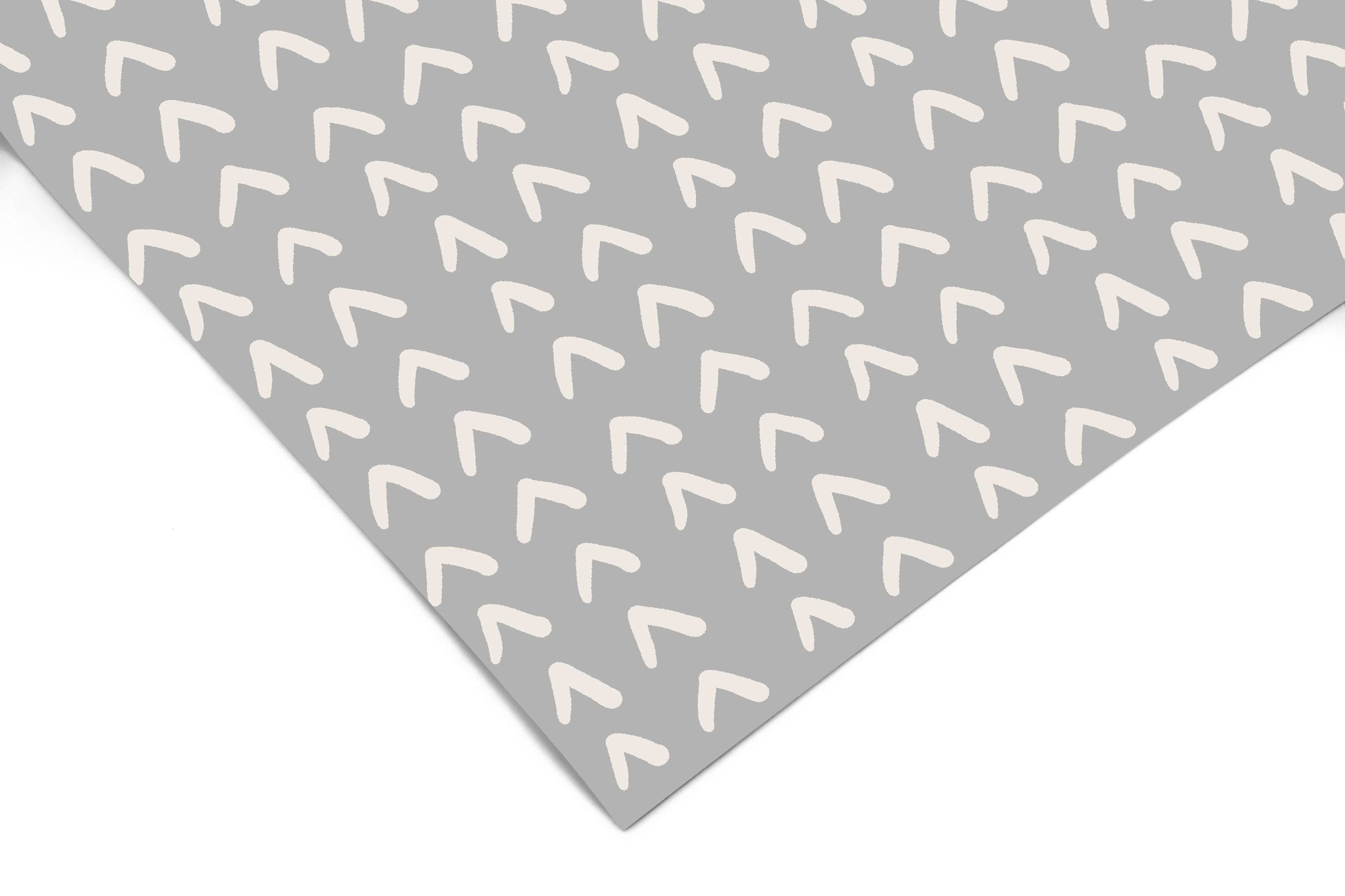 Gray Scandinavian chevron peel and stick contact paper on a kitchen backsplash